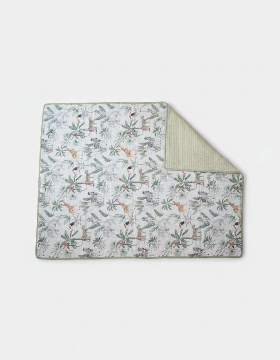 Forest Friends Turkish cotton baby blanket showing botanical pattern and soft backing